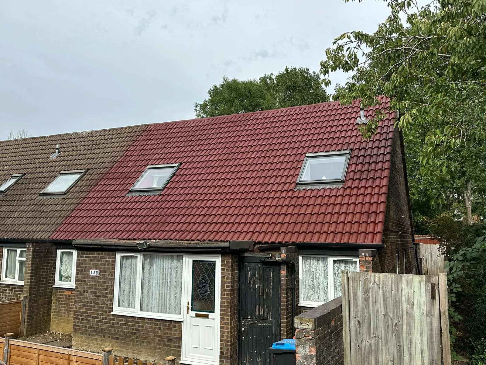 Completed red roof, full front elevation
